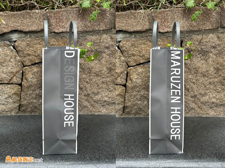 紙袋のマチ部分にはベタ印刷を施し、左右で異なる絵柄