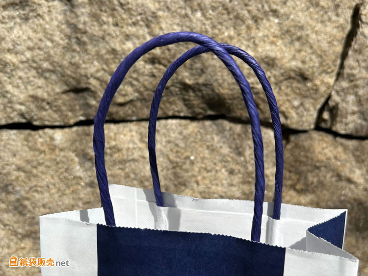 紙袋のハンドルは紙単紙(かみたんし)